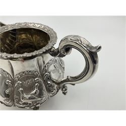 Victorian silver three piece tea service, comprising teapot, twin handled open sucrier, and milk jug, each of bellied form with acanthus capped scroll handles, the sides embossed with alternating scroll edged vacant panels and panels containing a pair of birds, upon four palmette feet, the teapot with ivory insulators to handle, and bird finial to the hinged domed cover, hallmarked William Hunter & Son, London 1861, teapot H19cm, including handles sucrier H13.5cm, including handle milk jug H12cm

This item has been registered for sale under Section 10 of the APHA Ivory Act