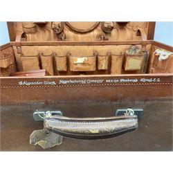 Vintage leather traveling case with monogram to cover, with watered silk lining to interior, and some contents, plus a further vintage travel case, (2)