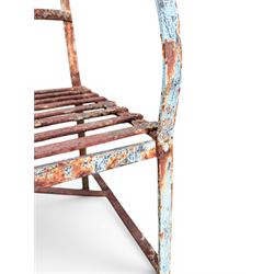 Regency period wrought iron strapwork garden bench, cresting rail with central Scottish thistle motif and flanking pediments, in distressed blue painted finish