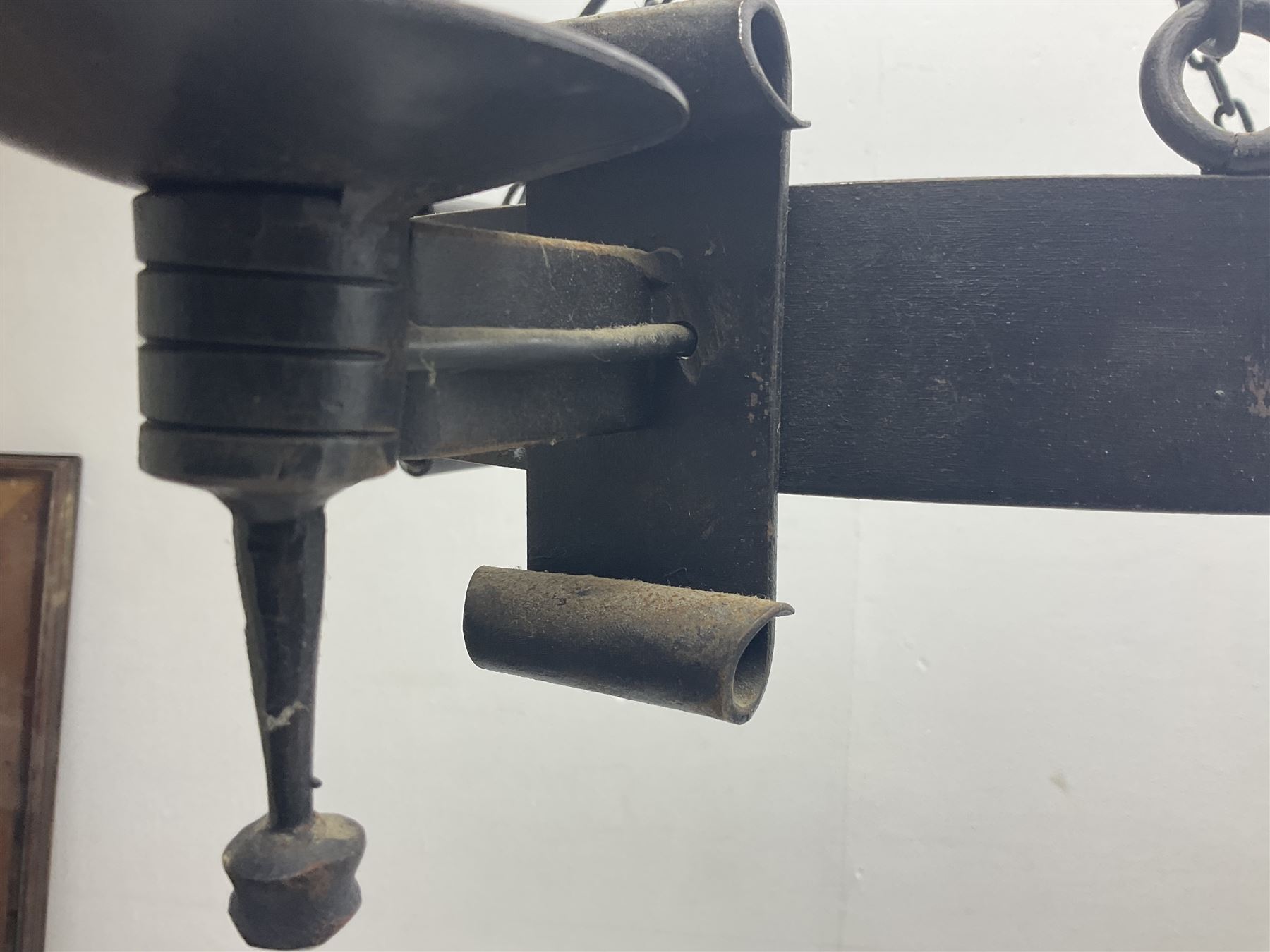 Pair of gothic style wrought iron ceiling lights, each with four branches, D58cm