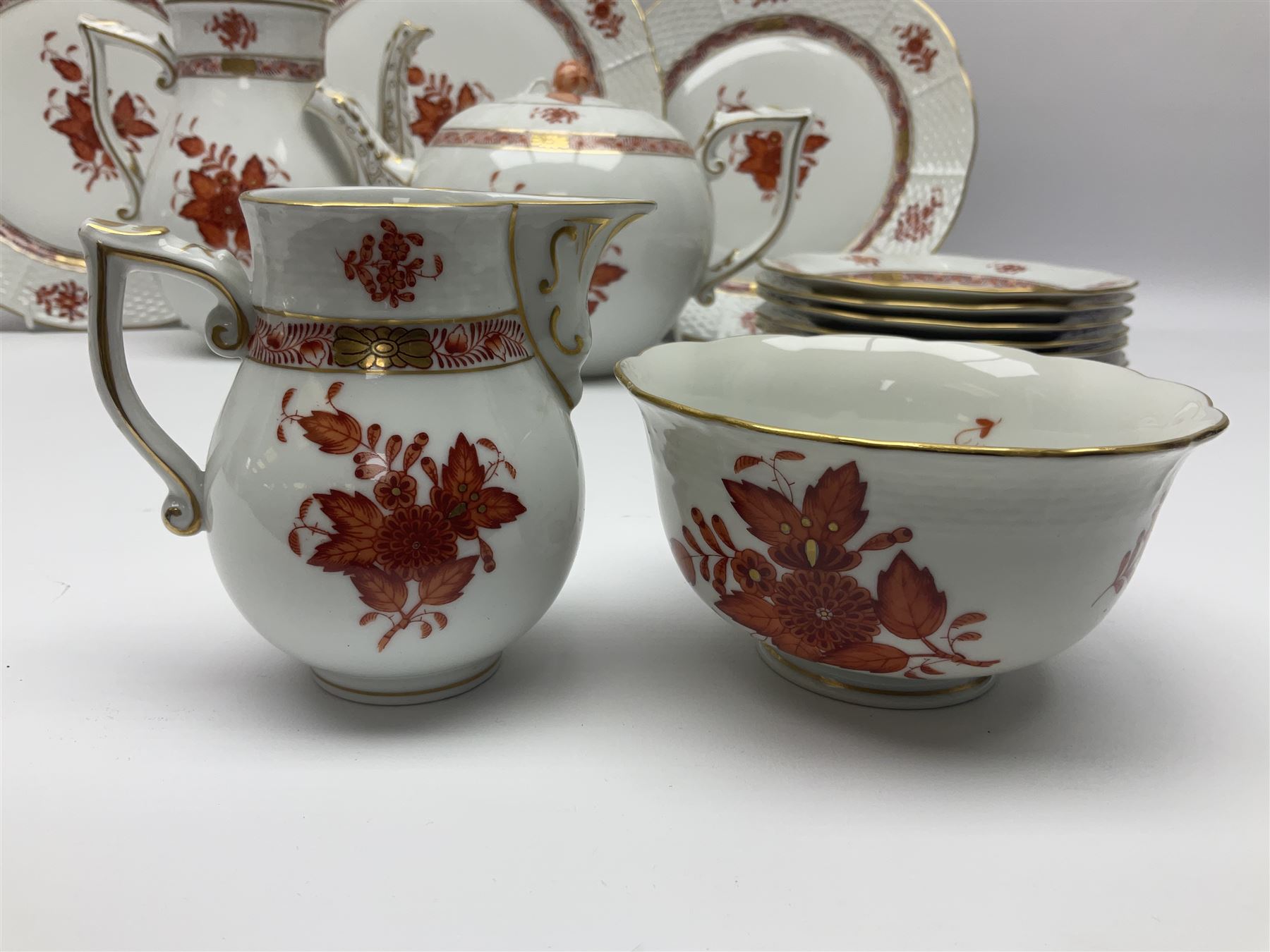 Herend Chinese Bouquet Rose pattern tea service comprising teapot, coffee pot, open sucrier, six cups and saucers, six tea plates, cream jug and stand, milk jug, two teabag holders, preserve pot, two leaf shaped dishes, four egg cups, salt & pepper pots, pair side plates and another plate
