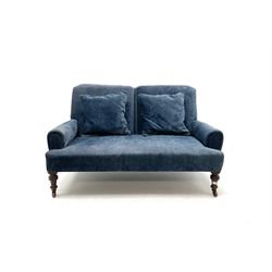 19th century two seat sofa, upholstered in a deep blue fabric, turned supports and castors 