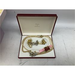 Cultured pearl jewellery comprising of eleven necklaces and seven bracelets, with a collection of costume jewellery including simulated pearl bracelets by Kenneth Jay Lane and a selection of Kirks Folly earrings, presented in a modern jewellery box 