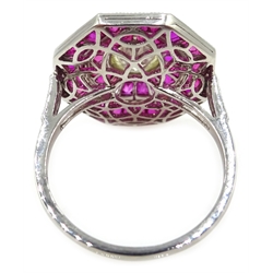 Old cut diamond and calibre cut ruby octagonal platinum (teste) target ring, with diamond set shoulders  