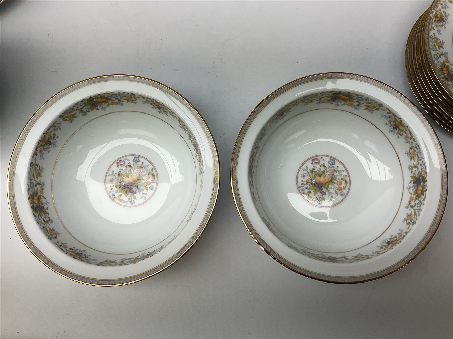 Noritake Ireland tea and dinner wears, comprising of teapot, milk jug, covered sucrier, seven teacups and saucers, seven dessert plates, six dinner plates, seven side plates, five bowls two serving dishes, one lidded tureen and a gravy boat and dish