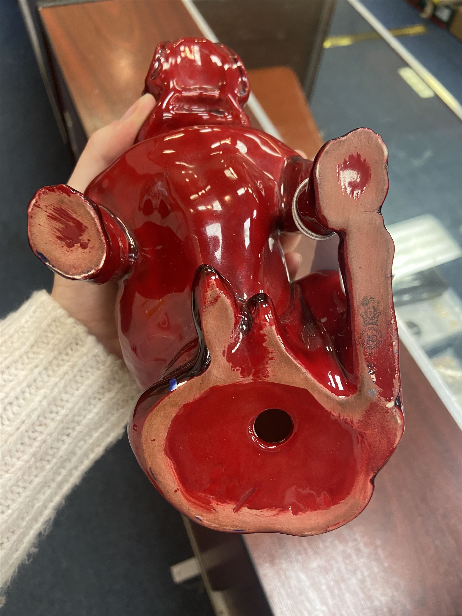 Royal Doulton Flambe figure of a Bulldog, modelled seated, model no 135, with printed maker's mark and K and impressed 135 beneath, H13.5cm