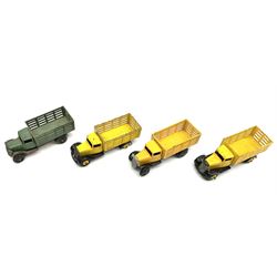 Dinky - four unboxed and playworn early post-war Market Gardener's Lorries No.30f, three with yellow bodies and one green (4)