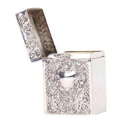 Late Victorian silver playing card box, of rectangular form with hinged top, the front and back embossed with vacant cartouche, surrounded by putti, foliate scrolls and C scrolls, hallmarked William Comyns & Sons, London 1900, H7.5cm W5.5cm D3.5cm