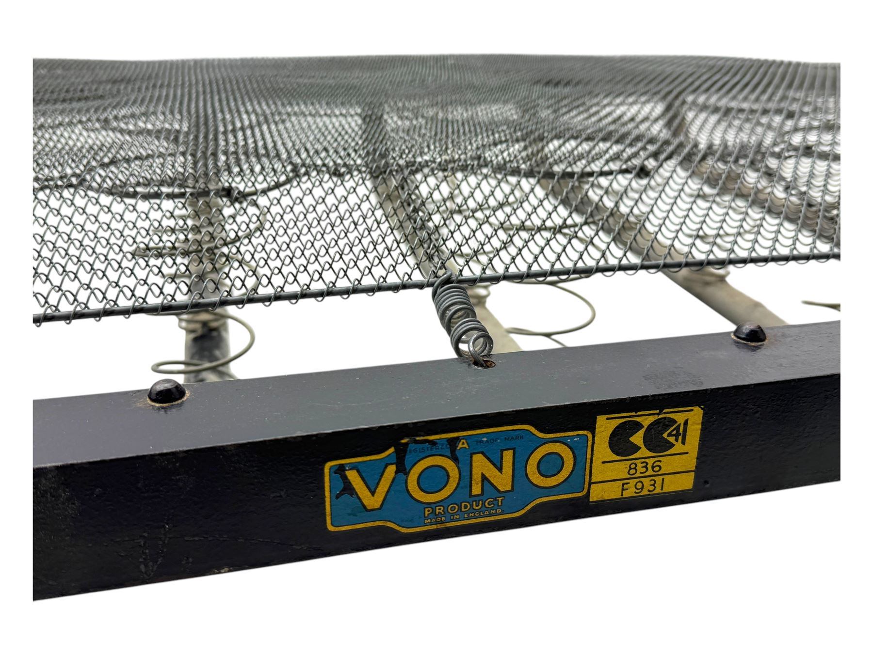 Mid-20th century walnut single bedstead, high shaped headboard, footboard with turned finials and scrollwork carvings, complete with 'Vono' iron frame, raised on cabriole supports