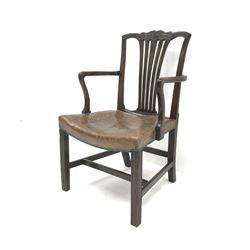 Georgian mahogany armchair, shaped and carved cresting rail, studded leather seat, square reeded supports, W59cm