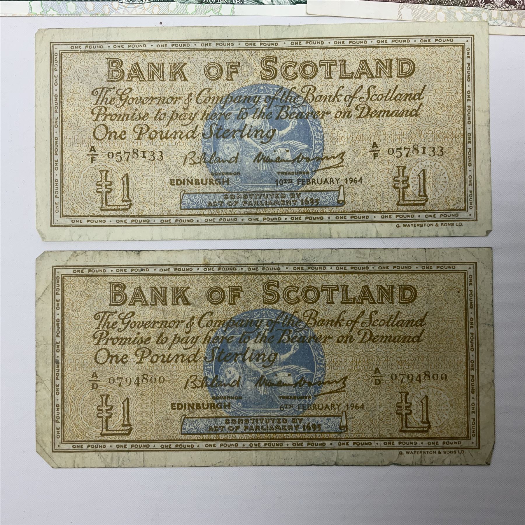 Irish and Scottish banknotes to include Bank of Ireland 5 January 1939 ‘B15’ one pound, two Bank of Scotland 1964 ‘AD07’ and ‘AF05’ one pound notes, one 1966 ‘CQ77’ one pound, and further notes from Clydesdale Bank, National Commercial Bank of Scotland Ltd. etc, housed in plastic sleeves