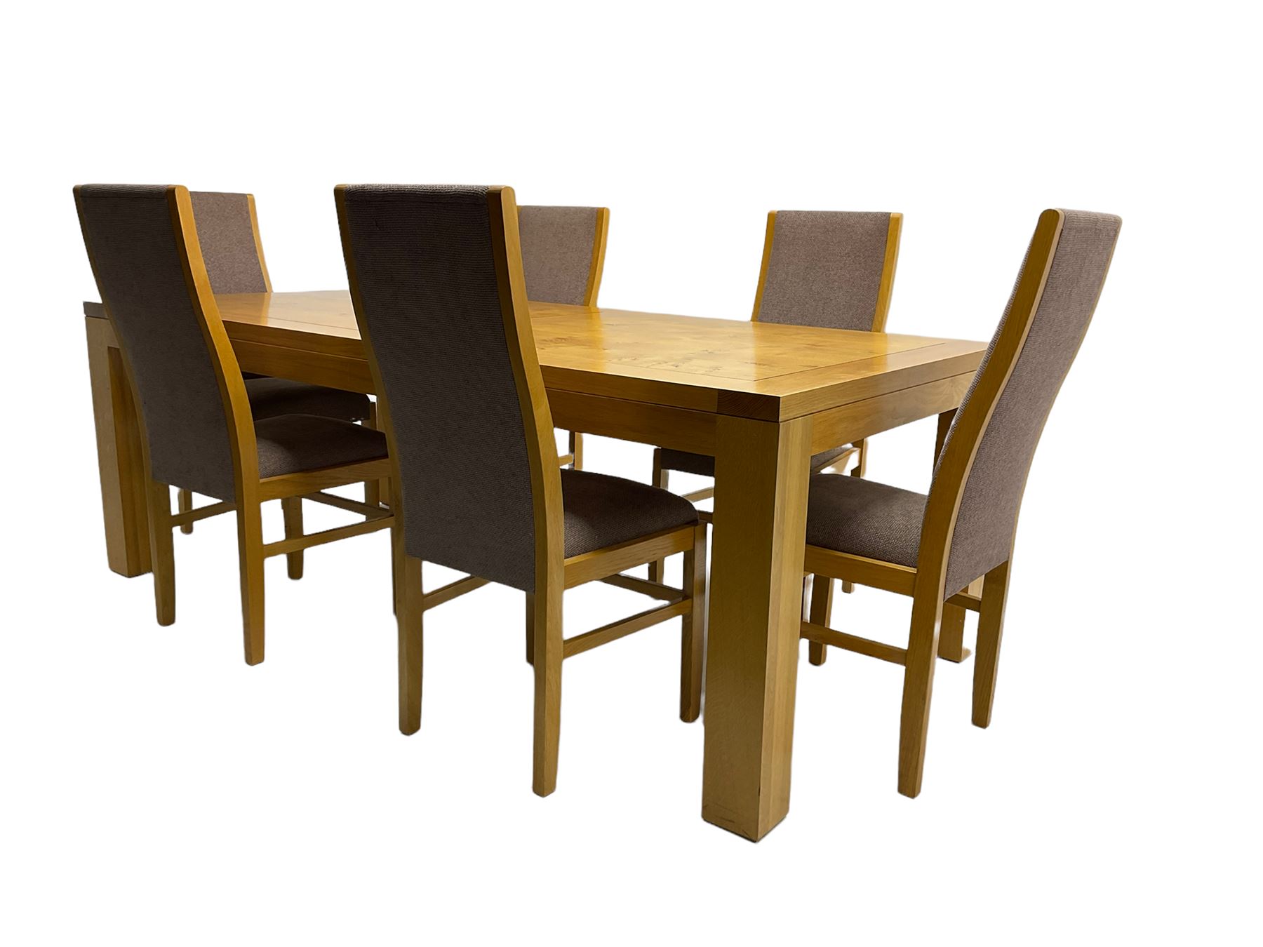 Large pippy oak rectangular dining table, square block leg, and six high back upholstered chairs, retailed by Chapmans of Newcastle