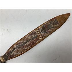 Australian Aboriginal shield, carved with Kangaroo and Emu, 74.5cm; Spear painted with aquatic creatures 78cm, and Spear thrower 81cm (3)