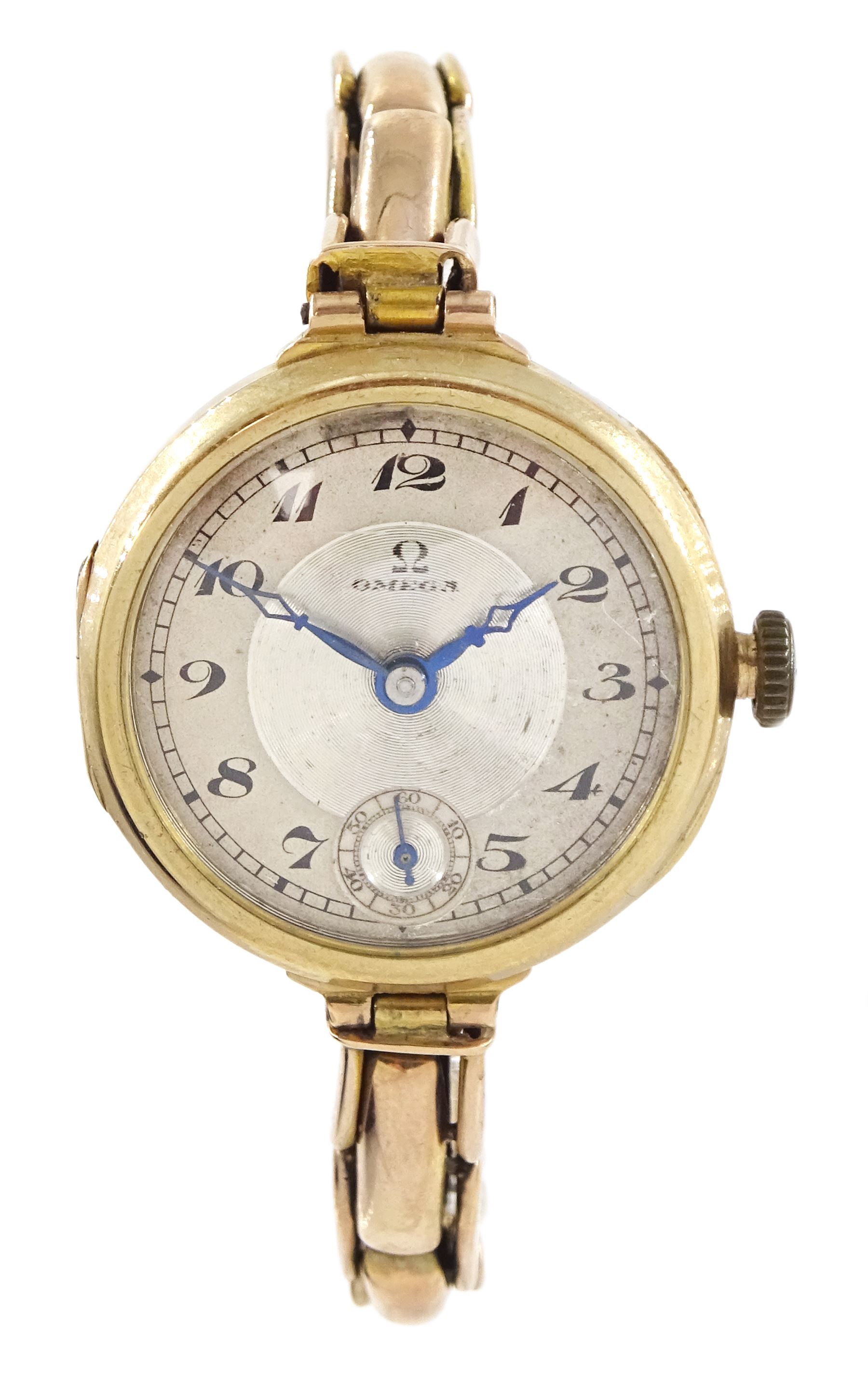 Omega early 20th century 9ct gold manual wind wristwatch, silvered dial with Arabic hour markers and subsidiary seconds dial, London import mark 1921, on expanding gold bracelet, stamped 9ct, boxed