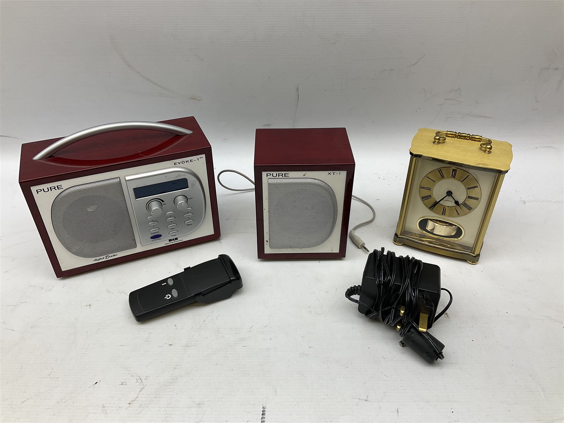 Pure Digital Evoke-1XT DAB digital radio and additional speaker, together with Quartz mantel clock