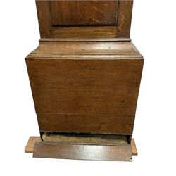 Early 19th century oak cased eight-day longcase clock c1810 - with a swan necked pediment and three matching brass finials, break arch hood door flanked by turned pilasters with brass capitals, trunk with a full length spire topped door on a square plinth with applied skirting, early painted dial with Roman numerals, Arabic five minutes, subsidiary seconds and date dials and steel hands, with floral spandrels and conforming decoration to the arch, dial pinned via a false plate to a rack striking movement, sounding the hours on a bell. With weights pendulum and key.