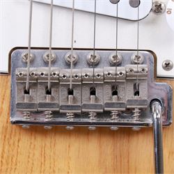 Fender Stratocaster electric guitar, serial no. MN8110169 made in Mexico c. 1998, with natural body, maple neck, three pickups, three control dials and five way selector switch, L99cm 