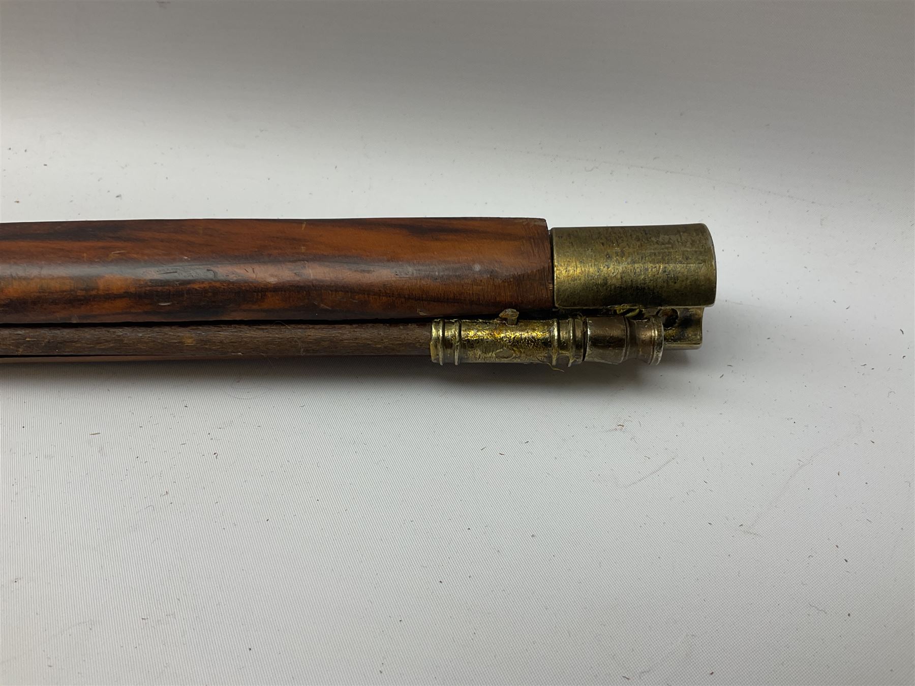 Reproduction non-firing Kentucky style flintlock musket musket, the 87.5cm hexagonal barrel with ramrod under, brass and brassed furniture and patch box to walnut stock L131cm overall