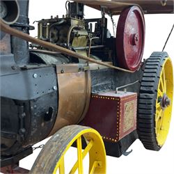 Mid-20th century scratch-built red and yellow painted live-steam scale model of a Showman's Traction Engine, 'Supreme' S.A. Oates & Sons, the simulated full length planked wooden canopy with brass supports and rope edging, with regulator, hand brake, chain steering , dynamo and water feed controls 19cm flywheel, 32cm diameter rear wheels with solid rubber tyres and 21cm diameter front wheels L102cm; together with scratch-built ride-on two-wheel trailer L58cm, and various brass rally plaques for 1980s/1990s.
This is a large, most interesting and comprehensive live-steam working model in need of re-furnishment and some repairs, the boiler has not been tested.