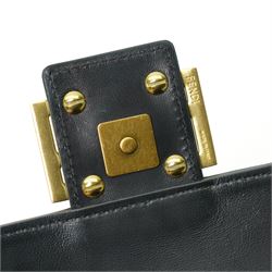 Fendi Baguette shoulder bag, black nappa leather with embossed FF monogram and quilted panels, the front flap secured by a gold-tone FF logo magnetic clasp engraved Fendi Made in Italy, with detachable leather shoulder strap and gold-tone hardware, interior leather tab stamped 'Baguette Fendi Made in Italy', together with original Fendi dust bag and box, W27cm D7cm H15cm