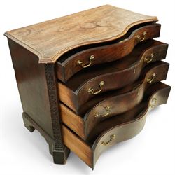 George III Chippendale period mahogany serpentine-fronted chest, shaped top with moulded edge over a deep serpentine outline with four graduated drawers, the canted corners decorated with blind-fretwork geometric decoration, fitted with brass swan-neck handles, lower moulded edge on bracket feet, circa 1760-1770