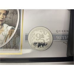 Commemorative coins and covers, including '80th Anniversary of the Battle of Britain' coin cover with Solomon Islands 2020 half dollar, 'Royal National Lifeboat Institution' coin cover with Alderney 2021 five pounds, 'Queen Elizabeth II's 95th Birthday' coin cover with Solomon Islands 2021 half dollar, other similar coin covers all in Harrington and Byrne folders, The Royal Mail 'HM The Queen's 95th Birthday' coin cover with 2021 five pounds and Queen Elizabeth II Isle of Man 2020 'Peter Pan' fifty pence coin collection in card folder