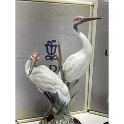 Two boxed Lladro figures, comprising courting cranes no 1611 and dancing crane no 1614, both with original boxes 
