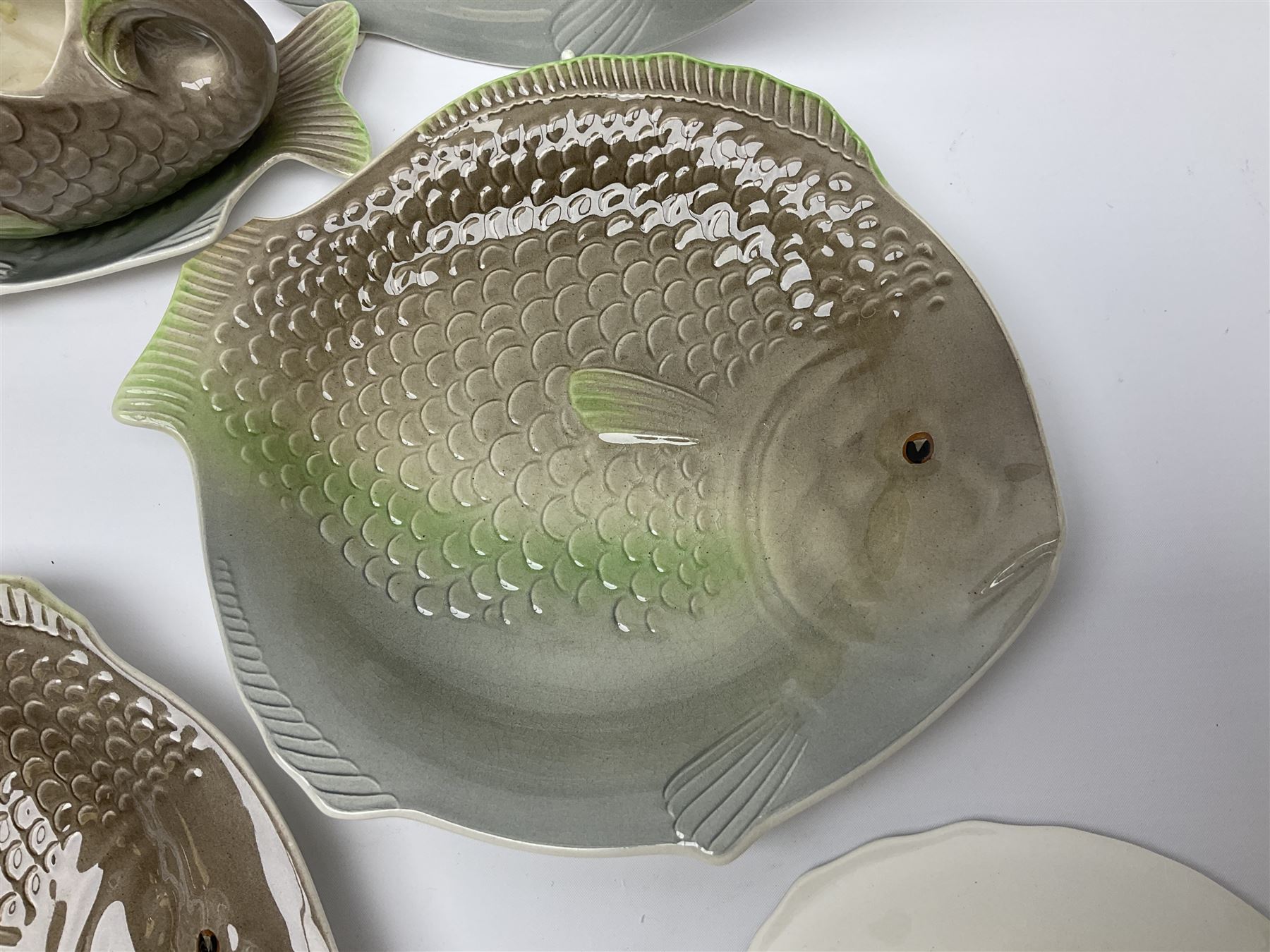 Shorter & Son six fish plates, together with a larger platter and sauce boat and saucer, all with stamped marks beneath
