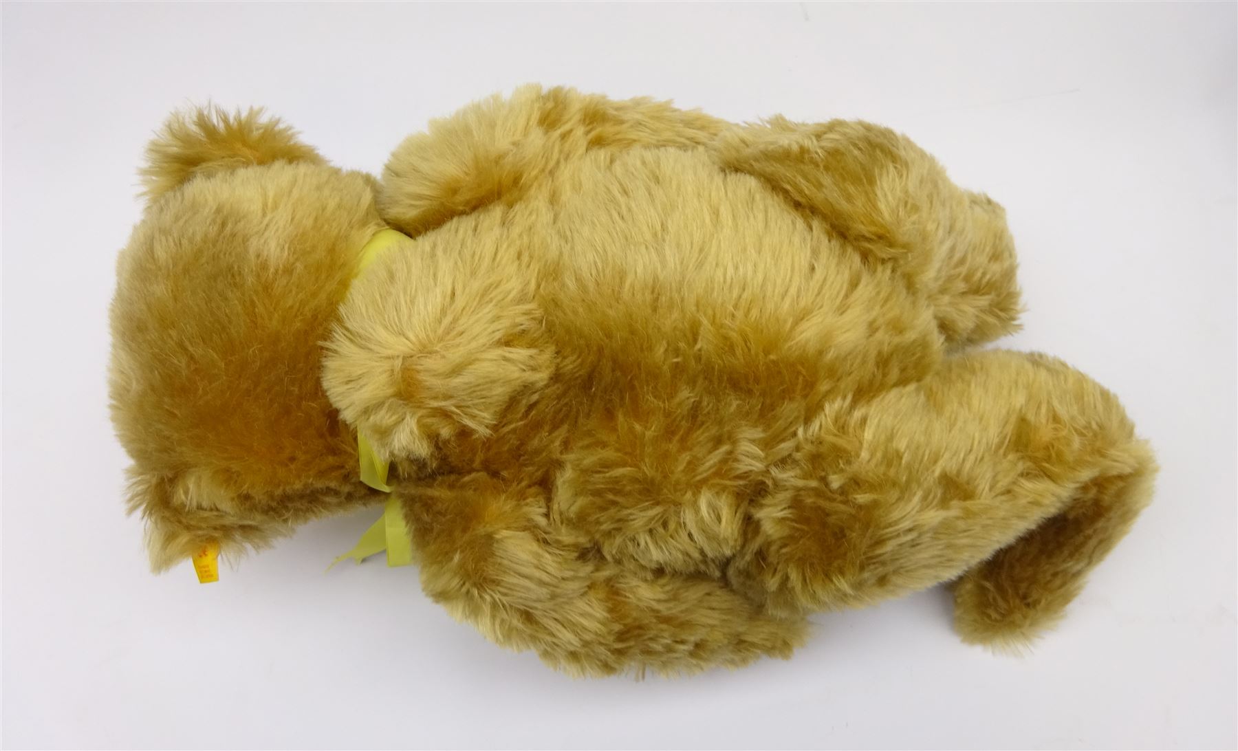 Steiff Replica 1903 Classic teddy bear, the golden mohair body with press squeaker and card tag No.000201 H21