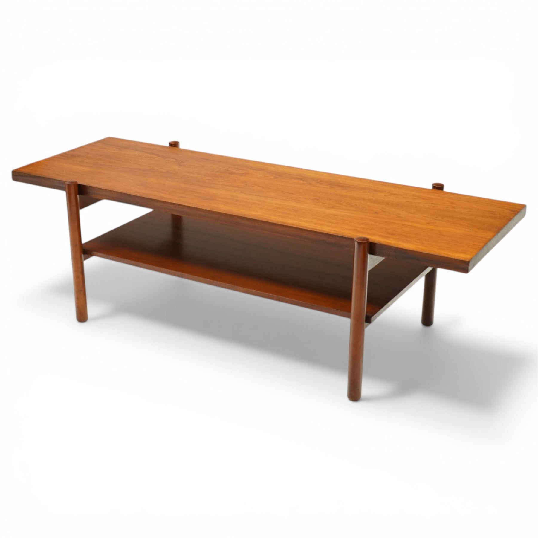 Mid-20th century Danish teak coffee table, rectangular top raised on cylindrical supports, united by under-tier 
