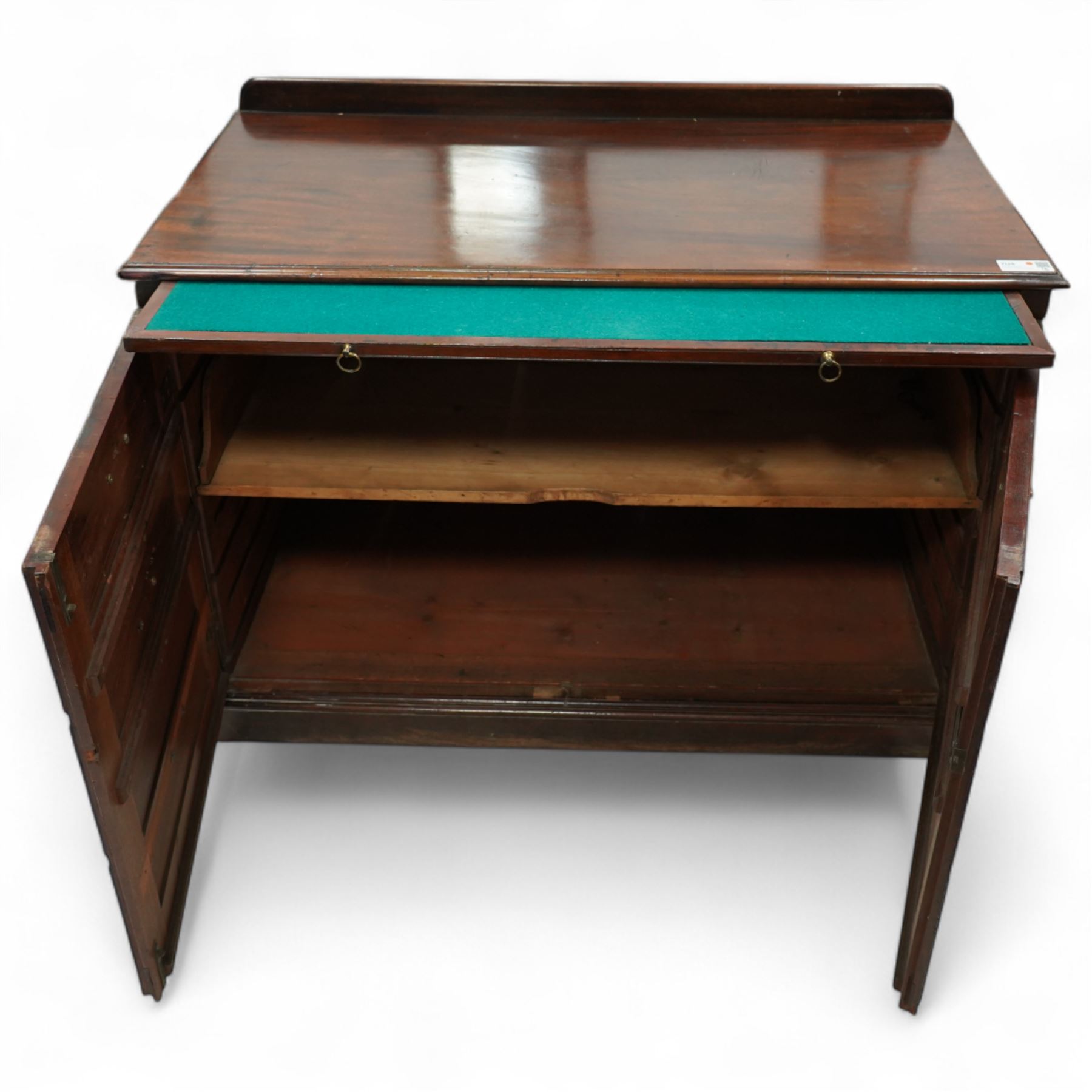 Early 20th century mahogany chest, rectangular top with raised gallery back with brushing slide on sliding tray, fitted with two cupboard doors behind six false drawer fronts, pierced brass handles on a plinth base
