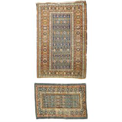 Two antique Caucasian Shirvan rugs, indigo field decorated with horizontal bands of small ...