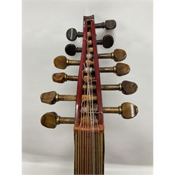 20th century Middle Eastern six string lute with a segmented back and a purpose designed hardwood stand