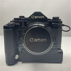 Canon A-1 camera body, serial no. 341014, with 'Canon FD 50mm 1:1.4 S.S.C.' lens, serial no. 12077119 and motor drive MA