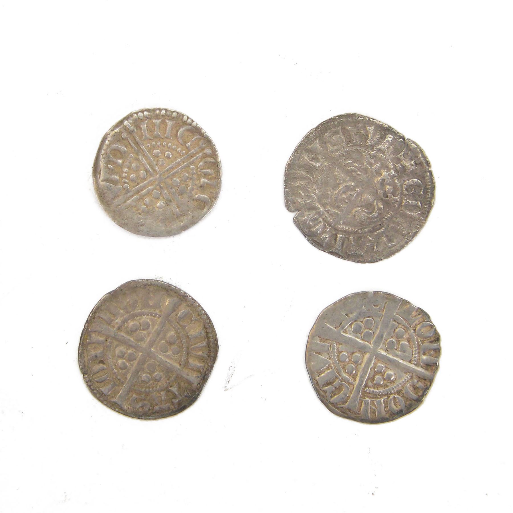 Four hammered silver coins, weighing 1.23, 1.39, 1.40 and 1.41 grams