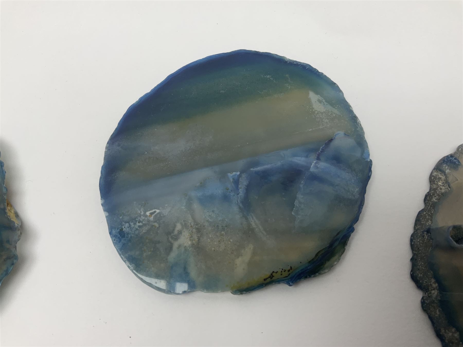 Five blue agate slices, polished with rough edges, H9cm, L7cm