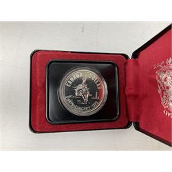 Great British and World coins, including Canadian 1975 dollar, United States of America 1975 proof set and bicentennial silver uncirculated set 1776-1976, Queen Elizabeth II Gibraltar 1977 sterling silver proof twenty-five pence, cased with certificate, New Zealand 1979seven coin set in blue wallet,  GB pre-decimal coins etc