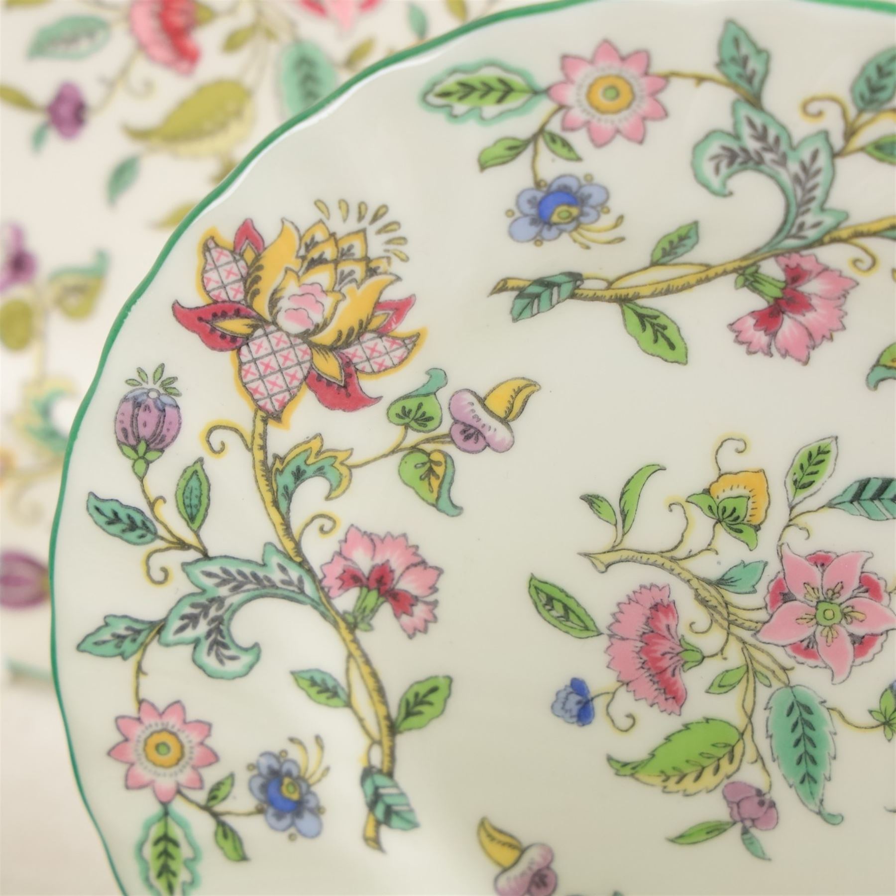 Minton Haddon Hall tea and dinner service, including teapot, milk jug, hot water jug, open sucrier, ten teacups and eight saucers, eight dinner plates, eight soup bowls, etc 