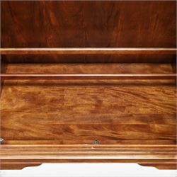 Willis & Gambier - mahogany bedroom wardrobe, projecting cornice with two additional rails, panelled doors with trouser rack and blue baize trinket, enclosing a shelf above a wooden clothes rail and shoe rack, raised on bracket feet 