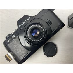 Collection of cameras and lenses, to include Pentax Program A camera body, serial no 123759, with 'Pentax-A zoom 1:3.5-4.5 28-80mm' len, Praktica EE2 camera body with 'Pentacon electric 1.8/50' lens etc, together with a Manfrotto tripod 