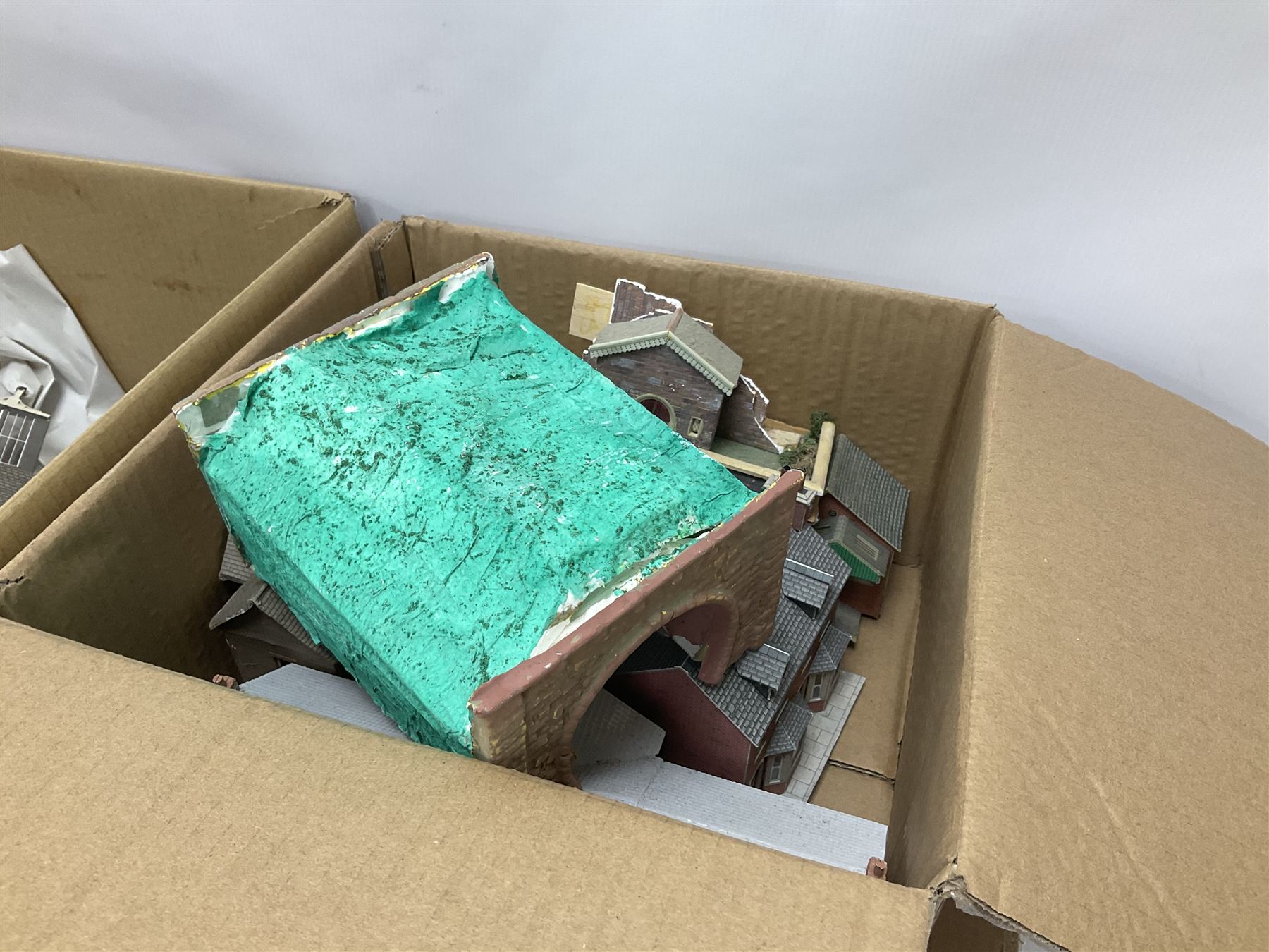 Extensive collection of scratch built buildings for use on ‘00’ gauge model railway layout, small amount of accessories and tools with a quantity of railway magazines and leaflets, in three boxes 