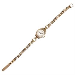 Majex ladies 9ct gold manual wind wristwatch, on integral 9ct gold bracelet, hallmarked