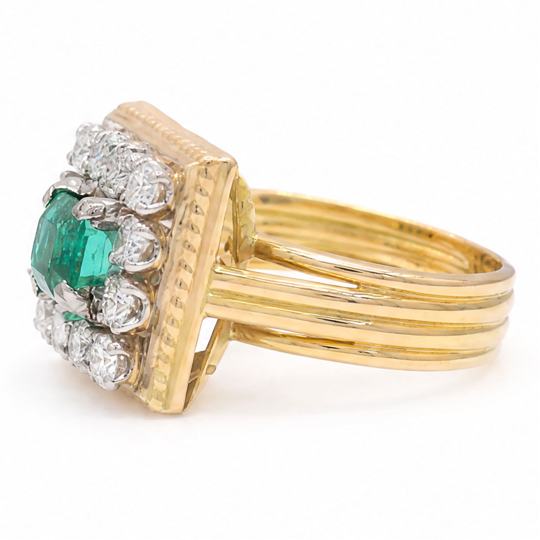 French 18ct gold emerald and diamond cluster ring, single octagonal cut emerald of approx 1.00 carat, surrounded by twelve round brilliant cut diamonds in a square setting, Eagle hallmark, total diamond weight approx 0.85 carat