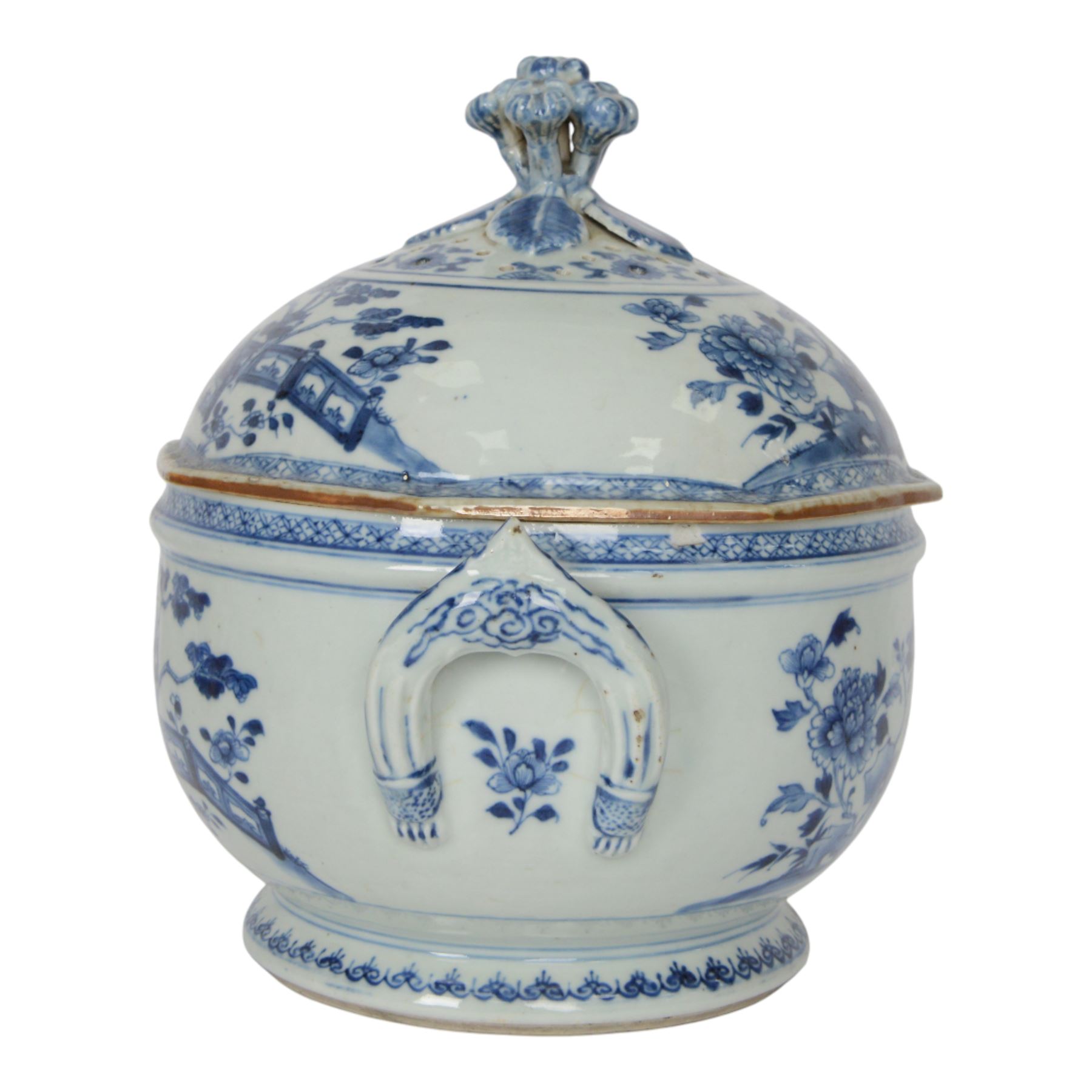Late 18th/early 19th century Chinese export blue and white tureen and cover, the body with twin curved handles, the pieced and domed cover with multi flower head finial, painted with peonies, rockwork, and fences, overall H26.5cm D22cn 