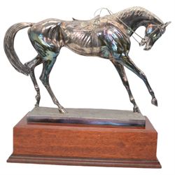 'The Freestone Stanley Lincoln Handicap Trophy, Doncaster Racecourse March 22nd 2003' - Silver filled model of a racehorse H32cm x W42cm on a mahogany plinth with silver plaque Sheffield 2003 Maker Laurence R Watson & Co.; together with a framed photograph of Guy Reed receiving the trophy (2)