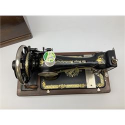 Cased early 20th century Singer hand sewing machine, lacking key