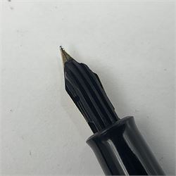 Pelikan Souveran 140 fountain pen, the green and black striped barrel with gold plated beak shaped clip and bands, with gold nib stamped 14C-585, together with matching twist ballpoint pen, push ballpoint pen and propelling pencil, largest approx L13.5cm (4)