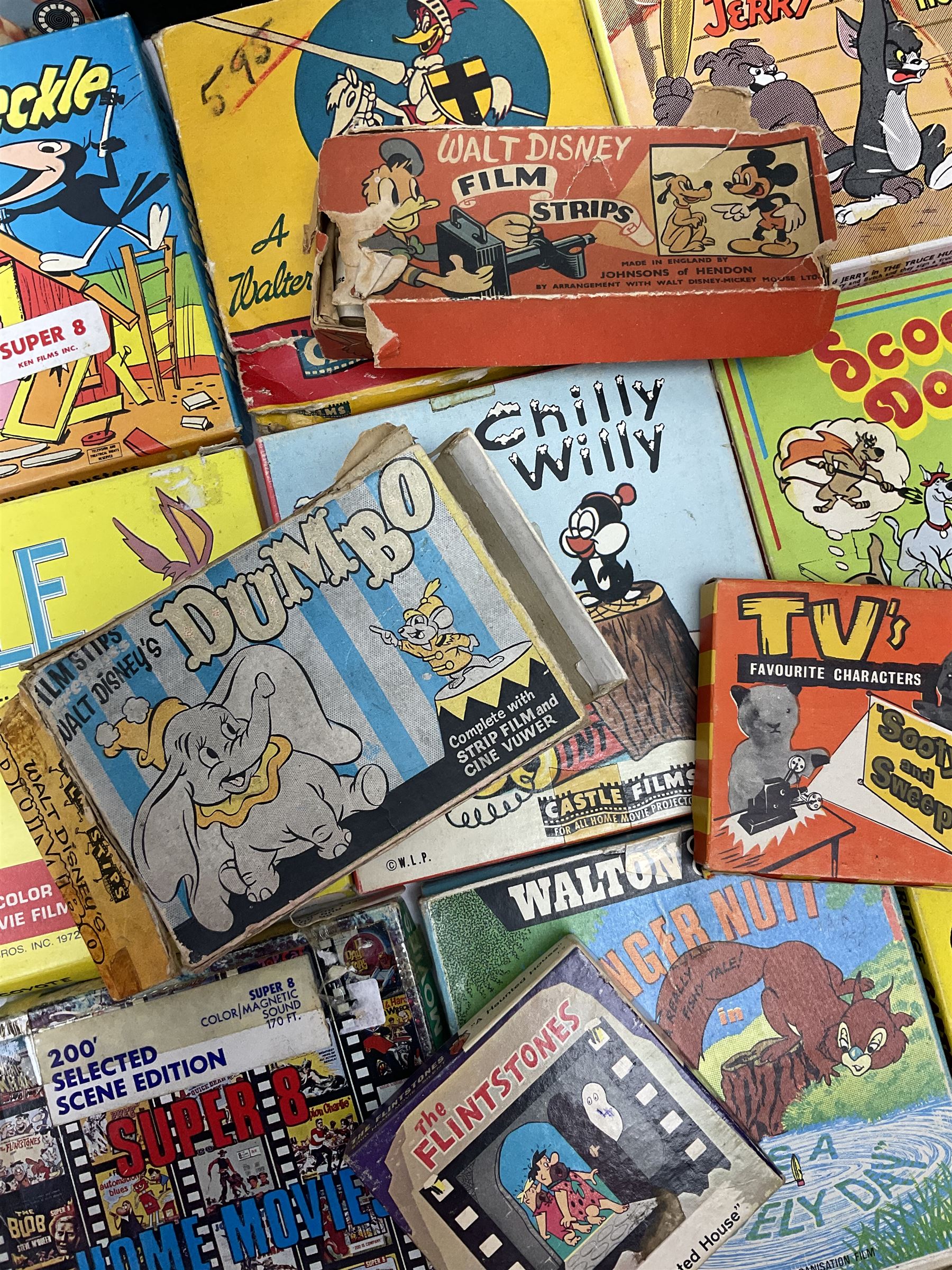 Corgi/Disney - Movie Vision, in original box, with Corgi projector, two Corgi Movie Viewers and nine films; together with 8mm film reels and strips to include Disney’s Dumbo, Mickey Mouse, Alice in Wonderland etc, most in original boxes