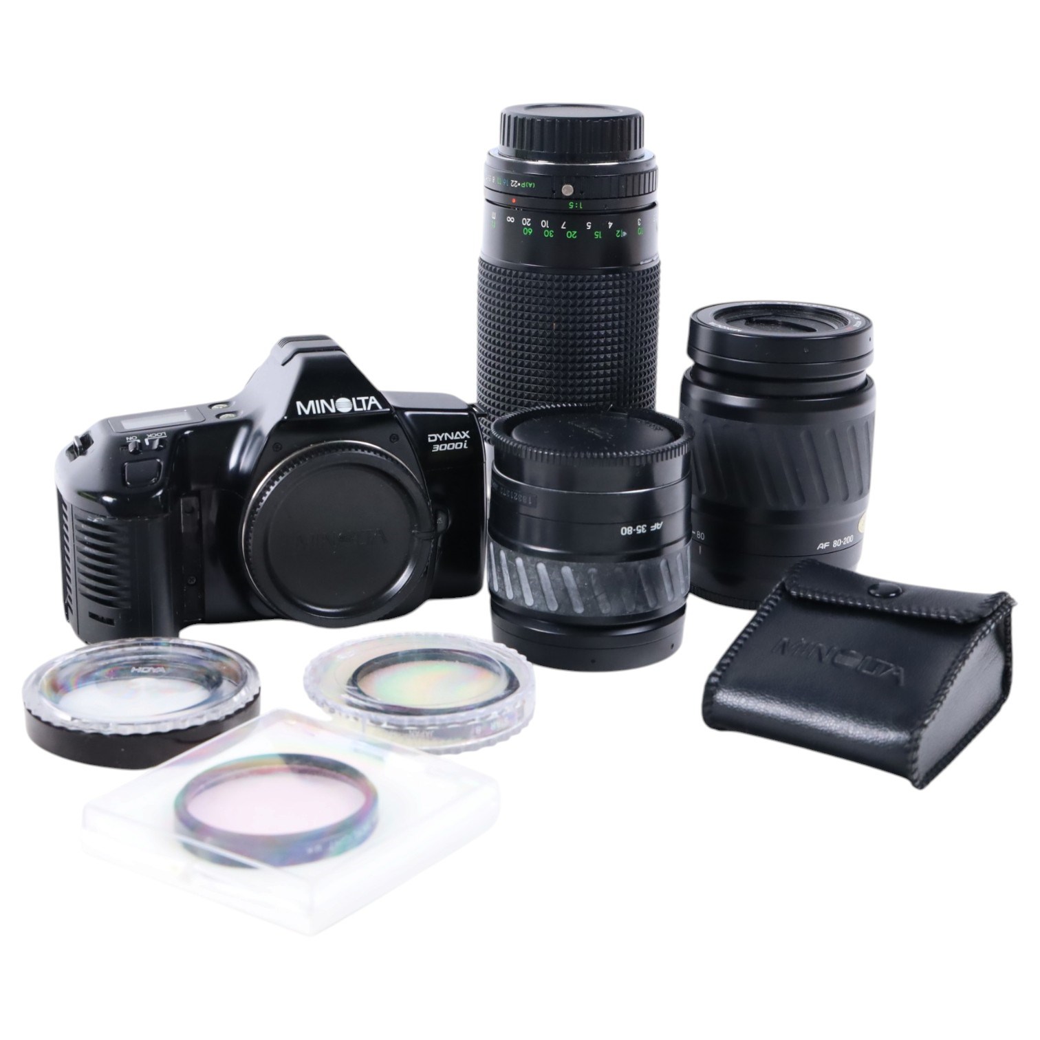 Minolta Dynax 3000i camera body, with three lenses including Sirius MC Auto Zoom 1:3.9 f=80-200mm, Minolta AF Zoom 80-200mm 1:4.5(22)-5.6 and Minolta AF Zoom 35-80mm 1:4(22)-5.6