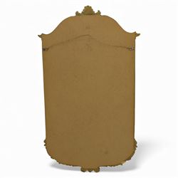 Late 20th century giltwood pier glass in a Rococo style, with rectangular mirror plate bordered by a heavily scrolled frame and foliate cresting